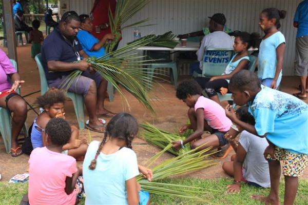 Photo of adults and kids involved in activities